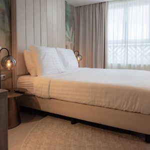 Kamer met een Queen Size Bed